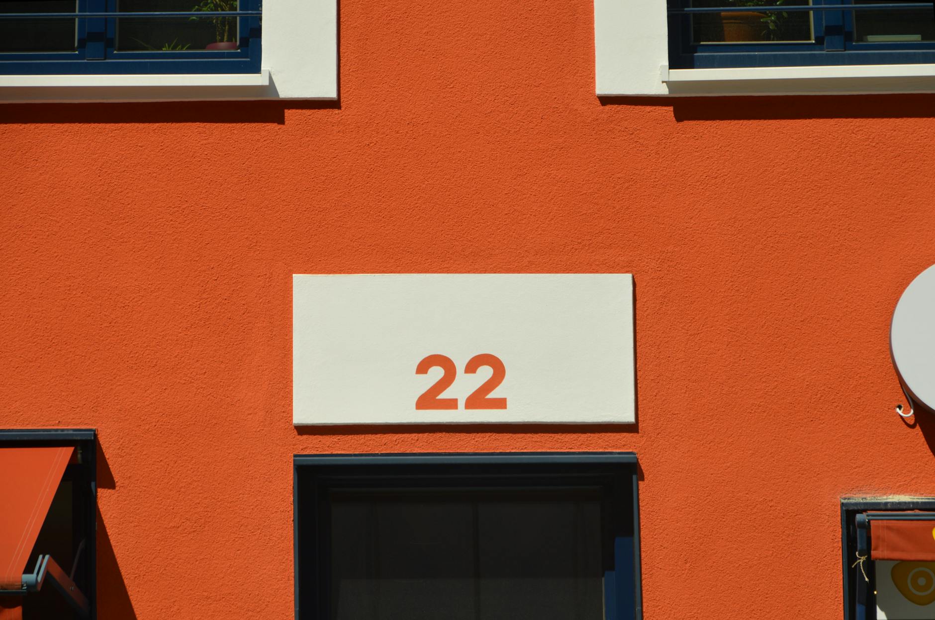 orange and white concrete building